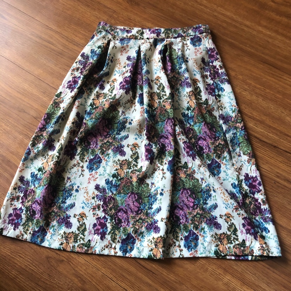 A line pleated floral skirt knee length